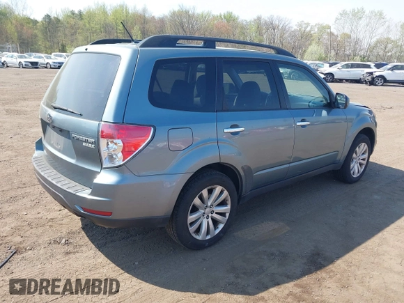 2011 Subaru Forester X Limited with VIN JF2SHAEC9BH713866, listed as a IAAI auction lot 42114557 with 148,404 mi miles and . Bid and sale history available at DreamBid. Image 4.
