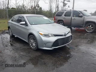 2016 Toyota Avalon Hybrid XLE Premium with VIN 4T1BD1EBXGU052909, listed as a IAAI auction lot 41587776 with 87,856 mi miles. Bid and sale history available at carsss.com. Image 1.
