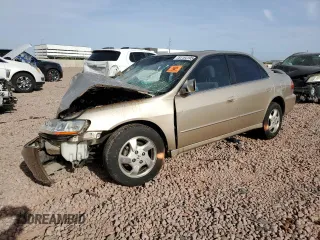 2000 Honda Accord EX z VIN JHMCG5652YC017349, wystawiony jako Copart lot #51184195 z przebiegiem 186 121 mil mil oraz Szkoda całkowita • Salvage title. Historia ofert i sprzedaży dostępna na DreamBid. Obrazek 1.