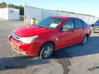 2008 Ford Focus S with VIN 1FAHP34N28W109922, listed as a IAAI auction lot 40579056 with 134,969 mi miles. Bid and sale history available at carsss.com. Image 2.