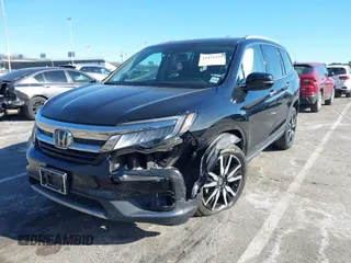 2022 Honda Pilot Touring 7-Passenger with VIN 5FNYF6H63NB006591, listed as a IAAI auction lot 41471359 with 75,574 mi miles. Bid and sale history available at carsss.com. Image 2.