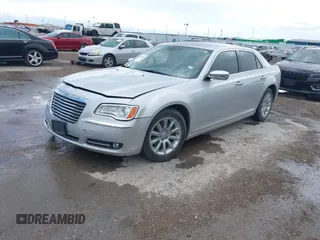 2012 Chrysler 300 Limited with VIN 2C3CCACGXCH212881, listed as a IAAI auction lot 41882643 with 160,645 mi miles. Bid and sale history available at carsss.com. Image 2.