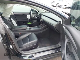 2022 Tesla Model 3 with VIN 5YJ3E1EA3NF287512, listed as a IAAI auction lot 42000557 with 77,619 mi miles. Bid and sale history available at carsss.com. Image 5.
