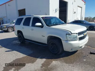 2012 Chevrolet Tahoe Commercial z VIN 1GNLC2E0XCR185593, wystawiony jako IAAI lot #41781021 z przebiegiem 150 423 mil mil oraz . Historia ofert i sprzedaży dostępna na DreamBid. Obrazek 1.
