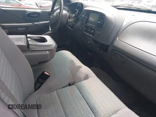 2002 Ford F-150 XL with VIN 2FTRX18W22CA23065, listed as a IAAI auction lot 42128001 with 262,452 mi miles and . Bid and sale history available at DreamBid. Image 5.
