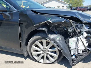 2020 Toyota Camry LE with VIN 4T1C11AK9LU387012, listed as a IAAI auction lot 42103647 with 64,049 mi miles and . Bid and sale history available at carsss.com. Image 18.