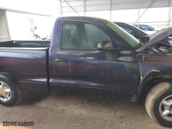 1998 Dodge Dakota "S" with VIN 1B7FL26Y3WS559713, listed as a IAAI auction lot 41055029 with 203,300 mi miles. Bid and sale history available at carsss.com. Image 13.