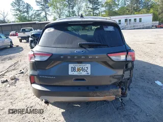 2020 Ford Escape Titanium Hybrid with VIN 1FMCU9DZ2LUA86600, listed as a IAAI auction lot 42059830 with 76,998 mi miles and . Bid and sale history available at DreamBid. Image 15.