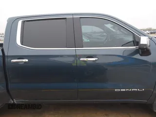2020 GMC Sierra 1500 Denali z VIN 1GTU9FEL1LZ120581, wystawiony jako IAAI lot #41428827 z przebiegiem 97 917 mil mil oraz . Historia ofert i sprzedaży dostępna na DreamBid. Obrazek 13.