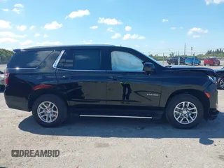 2023 Chevrolet Tahoe LS z VIN 1GNSCMKD9PR282840, wystawiony jako IAAI lot #41904280 z przebiegiem 73 298 mil mil oraz . Historia ofert i sprzedaży dostępna na DreamBid. Obrazek 12.