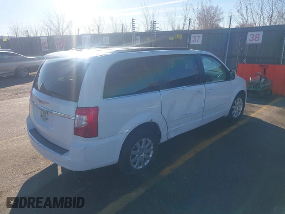 2015 Chrysler Town & Country LX with VIN 2C4RC1AG1FR678142, listed as a IAAI auction lot 41016680 with 78,756 mi miles and . Bid and sale history available at carsss.com. Image 4.