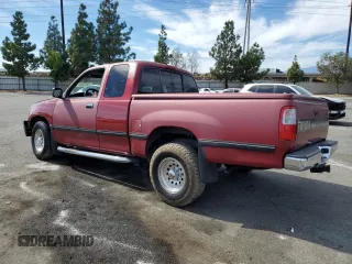 1996 Toyota T100 SR5 z VIN JT4TN14D7T0017707, wystawiony jako Copart lot #75676624 z przebiegiem 246 564 mil mil oraz Szkody całkowita. Historia ofert i sprzedaży dostępna na DreamBid. Obrazek 2.