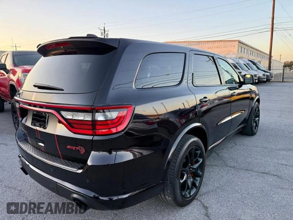 2021 Dodge Durango SRT Hellcat with VIN 1C4SDJH99MC822421, listed as a Copart auction lot 47705615 with 7,345 mi miles and Clean Title. Bid and sale history available at DreamBid. Image 4.
