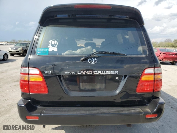 1999 Toyota Land Cruiser with VIN JT3HT05J8X0060988, listed as a Copart auction lot 52764175 with 217,199 mi miles and Salvage Title. Bid and sale history available at carsss.com. Image 6.