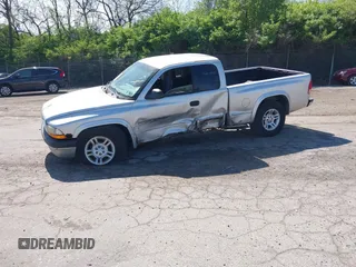 2001 Dodge Dakota SLT with VIN 1B7GG22XX1S348751, listed as a IAAI auction lot 42077395 with 148,034 mi miles and . Bid and sale history available at carsss.com. Image 2.