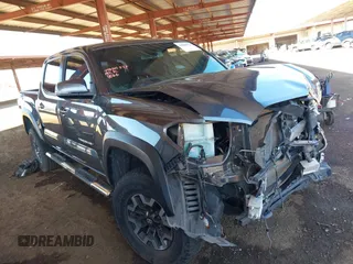 2019 Toyota Tacoma SR z VIN 3TMCZ5AN1KM254066, wystawiony jako IAAI lot #41868126 z przebiegiem 58 404 mil mil oraz . Historia ofert i sprzedaży dostępna na DreamBid. Obrazek 1.