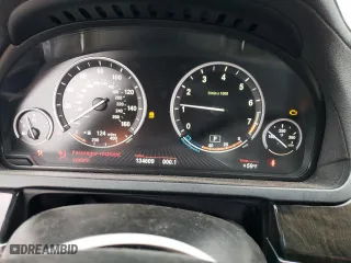 2013 BMW 7 Series 740Li with VIN WBAYE4C51DD137687, listed as a Copart auction lot 76103944 with 134,609 mi miles and Salvage Title. Bid and sale history available at carsss.com. Image 9.