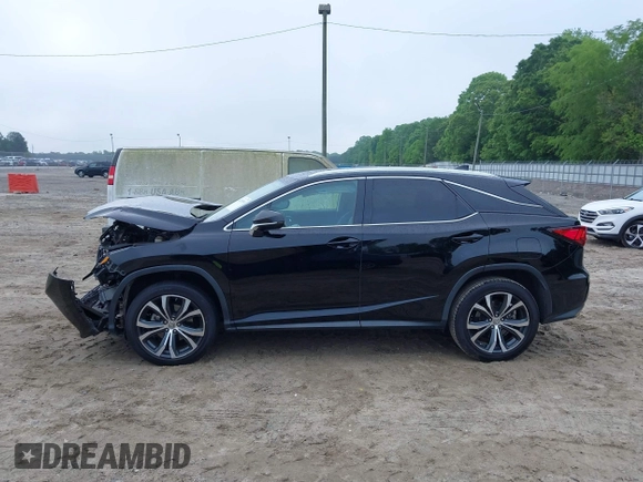 2016 Lexus RX 350 z VIN 2T2ZZMCA8GC005158, wystawiony jako IAAI lot #42105589 z przebiegiem 125 337 mil mil oraz . Historia ofert i sprzedaży dostępna na DreamBid. Obrazek 13.