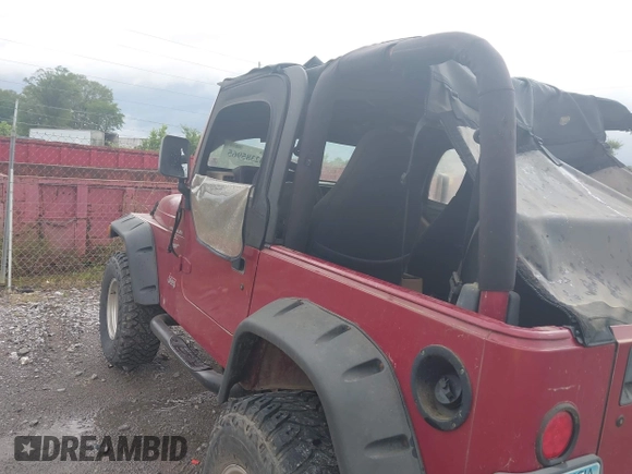 2000 Jeep Wrangler Sport with VIN 1J4FA49S2YP764321, listed as a IAAI auction lot 42385965 with Not provided miles and . Bid and sale history available at DreamBid. Image 3.