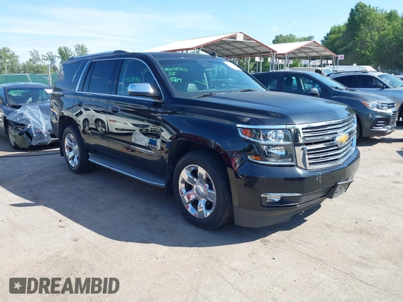 2015 Chevrolet Tahoe LTZ z VIN 1GNSKCKC3FR104845, wystawiony jako IAAI lot #42291785 z przebiegiem 75 047 mil mil oraz . Historia ofert i sprzedaży dostępna na DreamBid. Obrazek 1.