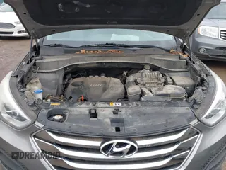 2016 Hyundai Santa Fe z VIN 5XYZTDLB1GG343763, wystawiony jako IAAI lot #41659641 z przebiegiem 96 415 mil mil oraz . Historia ofert i sprzedaży dostępna na DreamBid. Obrazek 10.