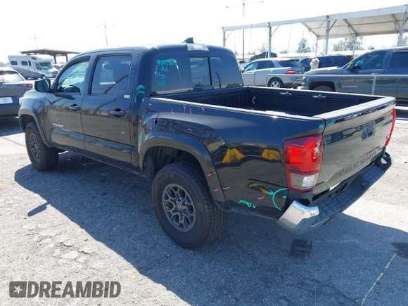 2018 Toyota Tacoma SR5 with VIN 3TMAZ5CN1JM061127, listed as a IAAI auction lot 42012247 with 119,381 mi miles and . Bid and sale history available at DreamBid. Image 3.