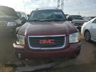 2004 GMC Envoy SLE with VIN 1GKDT13S342304711, listed as a Copart auction lot 44695385 with 129,804 mi miles and Salvage Title. Bid and sale history available at carsss.com. Image 5.
