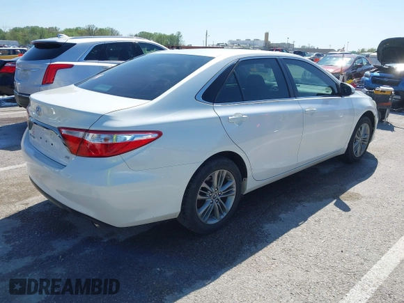 2015 Toyota Camry XLE with VIN 4T1BF1FK1FU055477, listed as a IAAI auction lot 42078518 with 233,159 mi miles and . Bid and sale history available at DreamBid. Image 4.