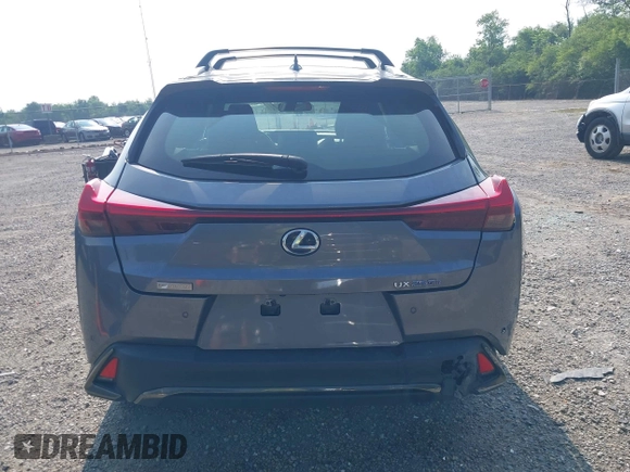 2021 Lexus UX 250h F Sport z VIN JTHE9JBHXM2045377, wystawiony jako IAAI lot #42580566 z przebiegiem 52 838 mil mil oraz . Historia ofert i sprzedaży dostępna na DreamBid. Obrazek 17.