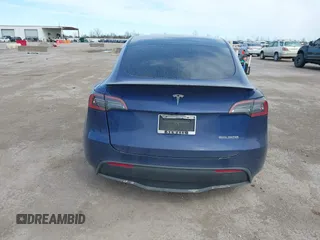 2021 Tesla Model Y Performance z VIN 5YJYGDEF8MF245641, wystawiony jako IAAI lot #41685230 z przebiegiem 25 903 mil mil oraz . Historia ofert i sprzedaży dostępna na DreamBid. Obrazek 15.