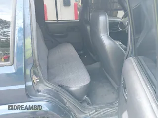 2001 Jeep Cherokee Sport with VIN 1J4FT48S71L525856, listed as a IAAI auction lot 42349383 with 218,122 mi miles and . Bid and sale history available at DreamBid. Image 8.