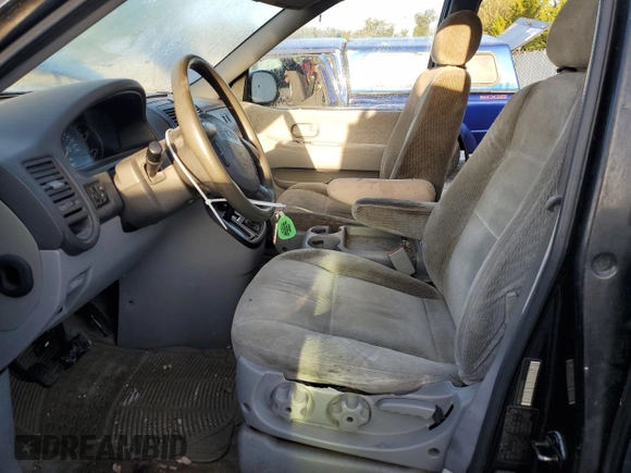 2005 Kia Sedona LX with VIN KNDUP131056640057, listed as a Copart auction lot 72153844 with 192,136 mi miles and Salvage Title. Bid and sale history available at carsss.com. Image 7.