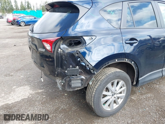 2015 Mazda CX-5 Touring with VIN JM3KE4CY5F0453646, listed as a IAAI auction lot 41740574 with 91,167 mi miles. Bid and sale history available at carsss.com. Image 18.