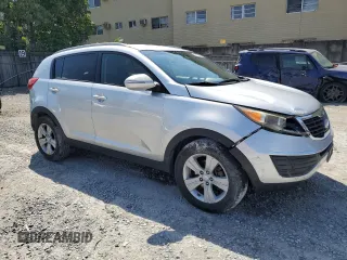 2013 Kia Sportage LX with VIN KNDPB3A26D7429389, listed as a Copart auction lot 50597295 with 217,197 mi miles and Salvage Title. Bid and sale history available at carsss.com. Image 4.