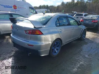 2008 Mitsubishi Lancer Evolution GSR with VIN JA3AW86V78U048263, listed as a IAAI auction lot 41670970 with 146,293 mi miles. Bid and sale history available at carsss.com. Image 4.