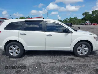 2013 Dodge Journey Canada Value z VIN 3C4PDCAB1DT646810, wystawiony jako IAAI lot #42484918 z przebiegiem 212 456 mil mil oraz . Historia ofert i sprzedaży dostępna na DreamBid. Obrazek 13.