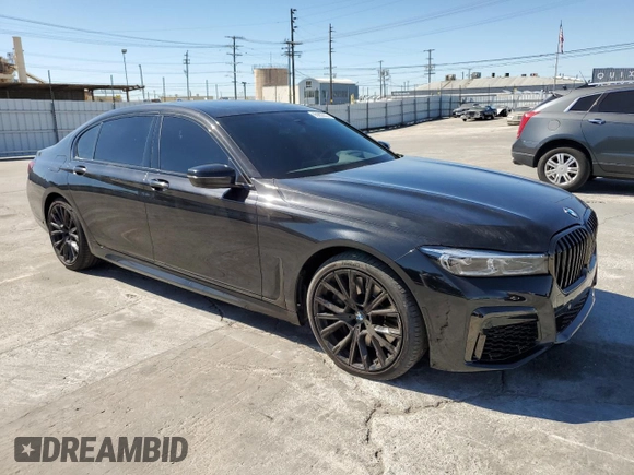 2022 BMW 7 Series 740i with VIN WBA7T2C00NCK41427, listed as a Copart auction lot 65962033 with 17,842 mi miles. Bid and sale history available at carsss.com. Image 4.