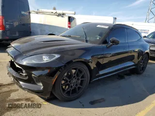 2021 Aston Martin DBX z VIN SCFVUJAWXMTV01292, wystawiony jako Copart lot #83824504 z przebiegiem Nie podano mil oraz Szkody całkowita. Historia ofert i sprzedaży dostępna na DreamBid. Obrazek 1.