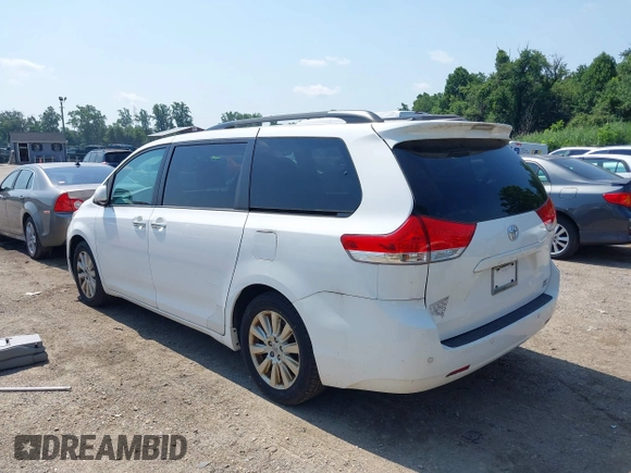 2014 Toyota Sienna Limited with VIN 5TDDK3DC3ES079590, listed as a IAAI auction lot 42694690 with 189,456 mi miles and . Bid and sale history available at DreamBid. Image 3.