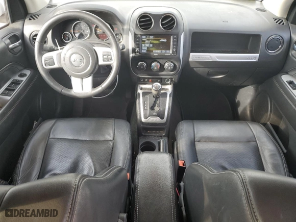 2016 Jeep Compass High Altitude Edition with VIN 1C4NJCEA1GD749348, listed as a Copart auction lot 43502645 with 97,389 mi miles and Salvage Title. Bid and sale history available at carsss.com. Image 8.