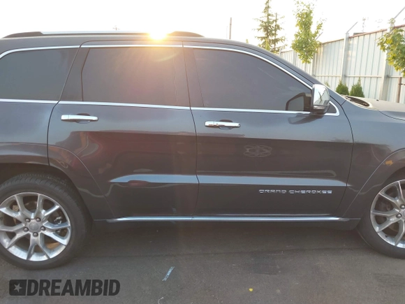2015 Jeep Grand Cherokee Summit with VIN 1C4RJFJT3FC748507, listed as a IAAI auction lot 40271829 with 86,859 mi miles. Bid and sale history available at carsss.com. Image 13.