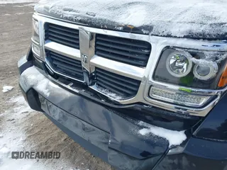 2007 Dodge Nitro SLT with VIN 1D8GU58K97W583862, listed as a IAAI auction lot 41378801 with 227,713 mi miles. Bid and sale history available at carsss.com. Image 6.