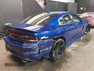 2022 Dodge Charger R/T with VIN 2C3CDXCT9NH127952, listed as a IAAI auction lot 42020401 with 55,483 mi miles and . Bid and sale history available at carsss.com. Image 4.