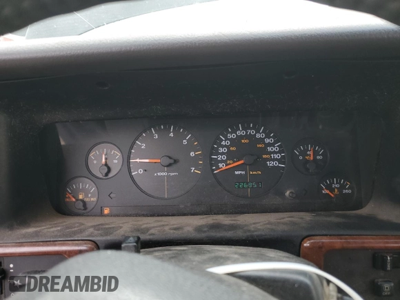 1996 Jeep Grand Cherokee with VIN 1J4EZ58S8TC106529, listed as a Copart auction lot 50163965 with 226,951 mi miles and Salvage title. Bid and sale history available at DreamBid. Image 9.
