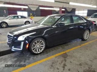 2015 Cadillac CTS Luxury RWD z VIN 1G6AR5S36F0134800, wystawiony jako Copart lot #57680835 z przebiegiem 95 607 mil mil oraz Czysty tytuł • Clean title. Historia ofert i sprzedaży dostępna na DreamBid. Obrazek 1.