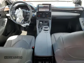 2019 Toyota Avalon Limited Hybrid z VIN 4T1B21FB3KU009896, wystawiony jako Copart lot #52939325 z przebiegiem 40 597 mil mil oraz Szkoda całkowita • Salvage title. Historia ofert i sprzedaży dostępna na DreamBid. Obrazek 8.