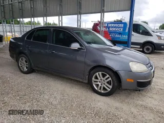 2007 Volkswagen Jetta 2.5 с VIN 3VWSF71KX7M032930, выставлен на аукционе Copart как лот 56703405 с пробегом 216 233 миль миль и Списание • Salvage title. История ставок и продаж доступна на DreamBid. Изображение 4.