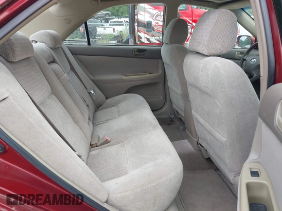 2002 Toyota Camry LE z VIN 4T1BE30K32U110304, wystawiony jako IAAI lot #42357455 z przebiegiem 221 389 mil mil oraz . Historia ofert i sprzedaży dostępna na DreamBid. Obrazek 8.