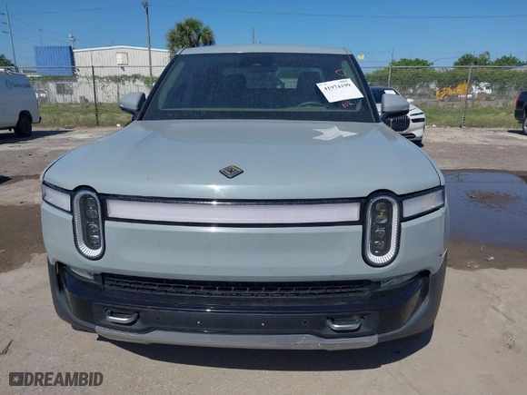 2022 Rivian R1T Adventure Package with VIN 7FCTGAAA2NN006053, listed as a IAAI auction lot 41974199 with 286 mi miles. Bid and sale history available at carsss.com. Image 6.