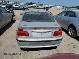 2004 BMW 3 Series 325xi with VIN WBAEU33404PM60151, listed as a Copart auction lot 57120235 with 116,859 mi miles and Salvage title. Bid and sale history available at DreamBid. Image 6.